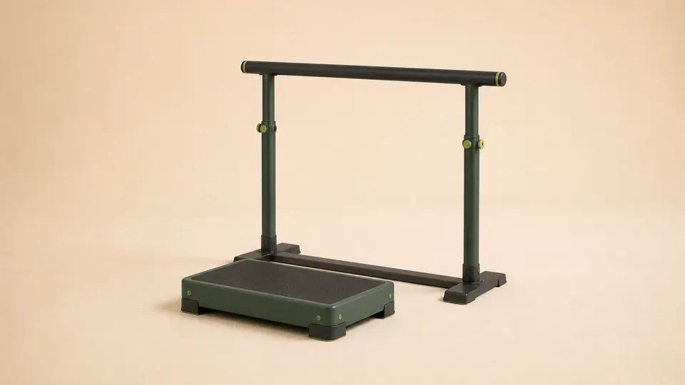 A low calf-raise block positioned beside a stable support rail.